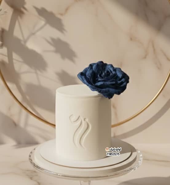 كيك عقد او خطوبه مغطى بعجينه السكر