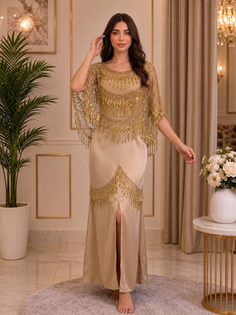 فستان سهرة بيج بتطريز وشراشيب ذهبية